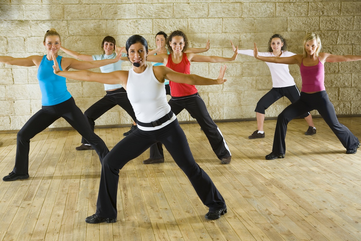 A fitness instructor with a group of women