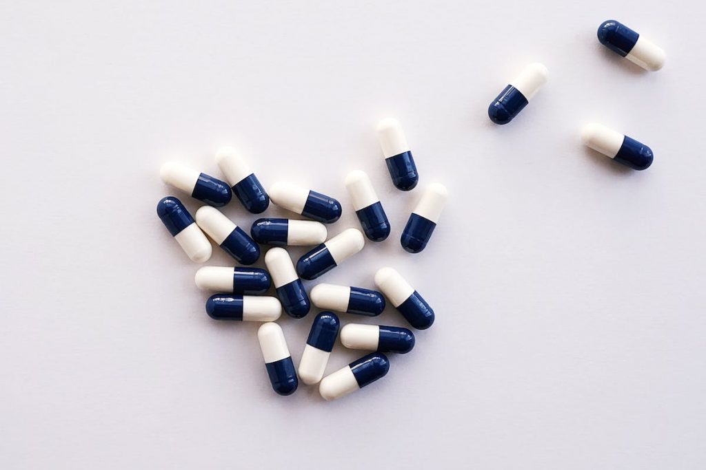 White and Blue Medication Pills